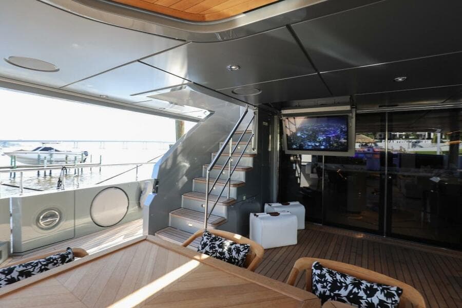 Luxurious 2025 Majesty 120 yacht interior with modern design and outdoor seating.