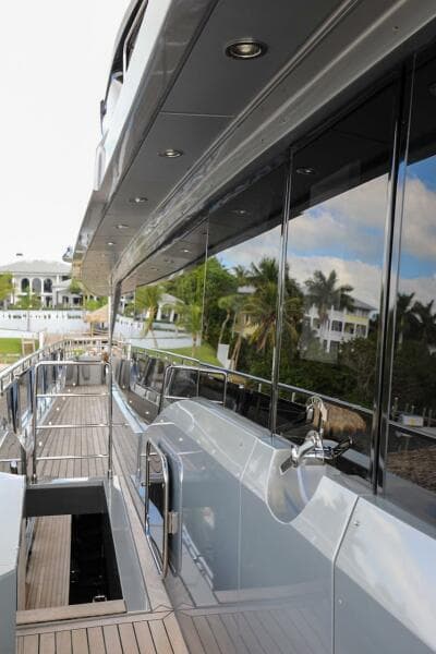 Side view of 2025 Majesty 120 yacht with sleek design and modern architecture.