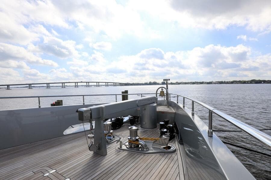 Majesty 120 yacht deck, 2025 model, cruising on a sunny day with bridge view.