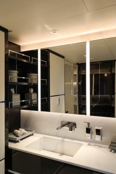 Luxurious bathroom in 2025 Majesty 120 yacht with modern fixtures and elegant design.
