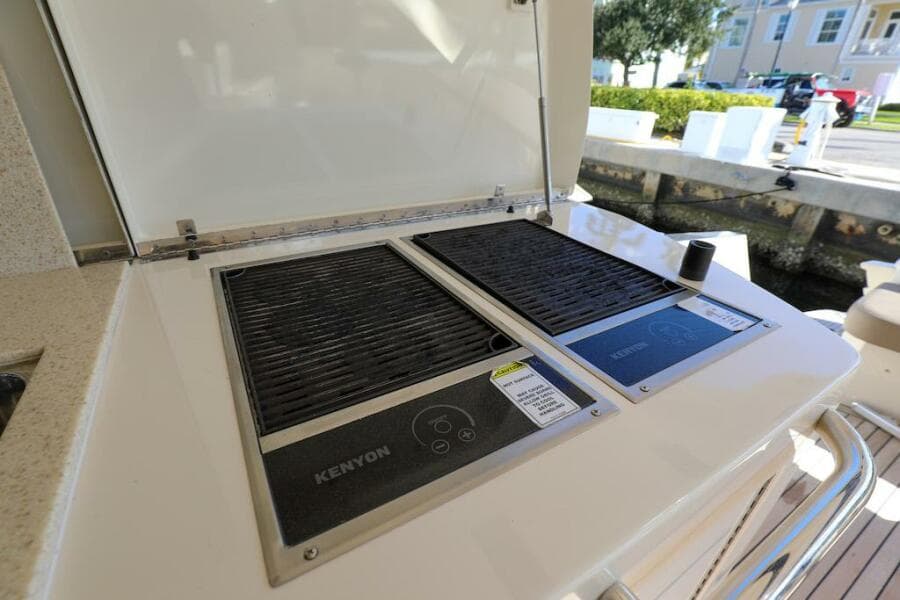 Kenyon grill on 2016 Marquis 660 Sport Yacht deck.
