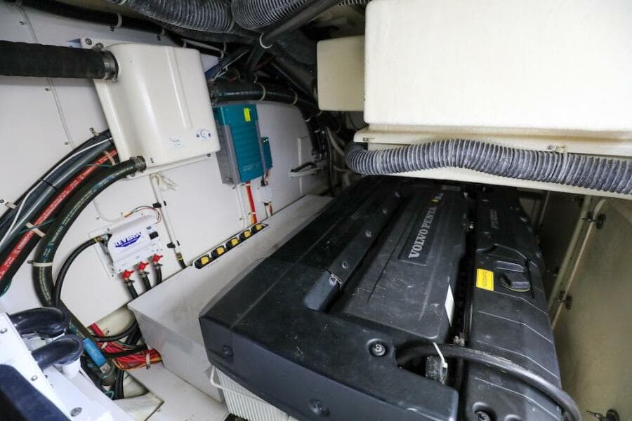 Engine room of 2016 Marquis 660 Sport Yacht with Volvo Penta engine.
