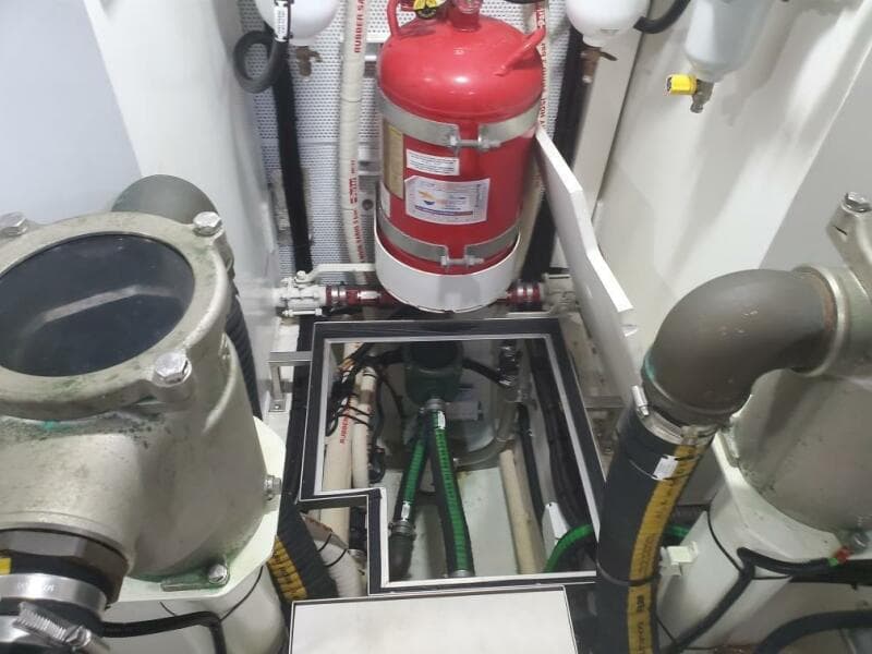 Engine room of a 2020 Galeon 500 Fly yacht with fire extinguisher.
