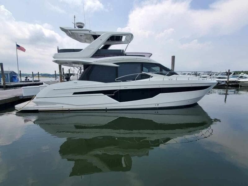 2020 Galeon 500 Fly yacht docked at a marina.