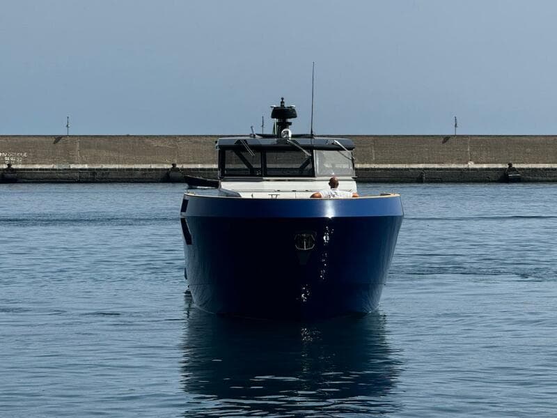 2025 Aicon Audace 50 yacht in harbor, front view, calm water.