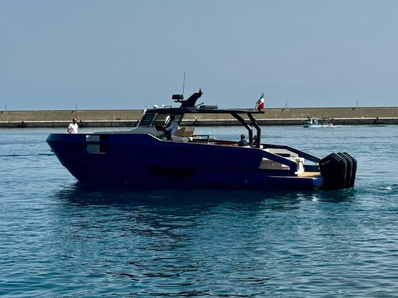 2025 Aicon Audace 50 yacht on calm water, side view.
