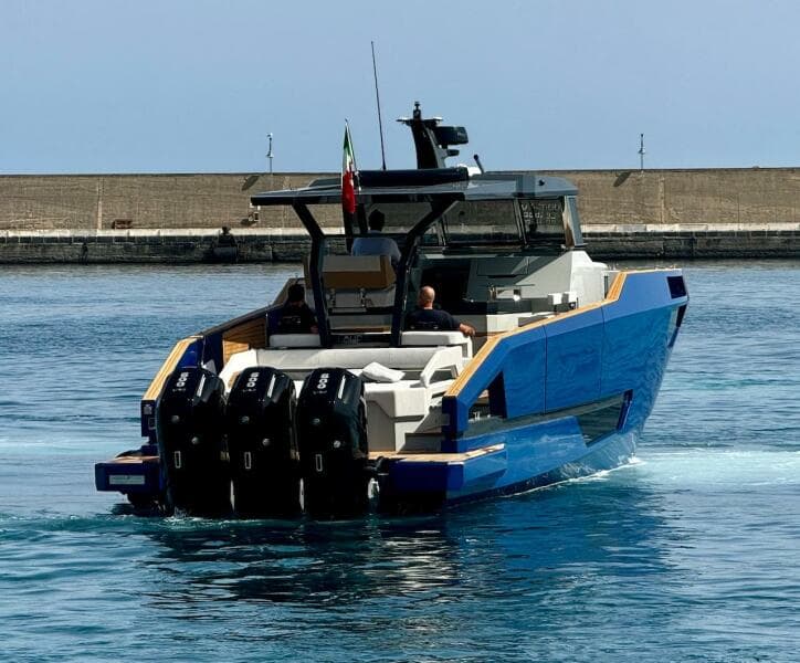 Aicon Audace 50 yacht, 2025 model, cruising in a harbor with powerful engines.