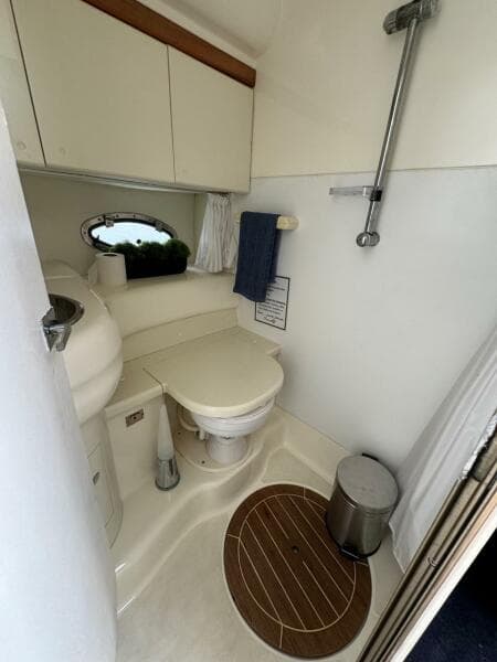 Bathroom interior of 2003 Cranchi Endurance 39 yacht, featuring toilet and shower.