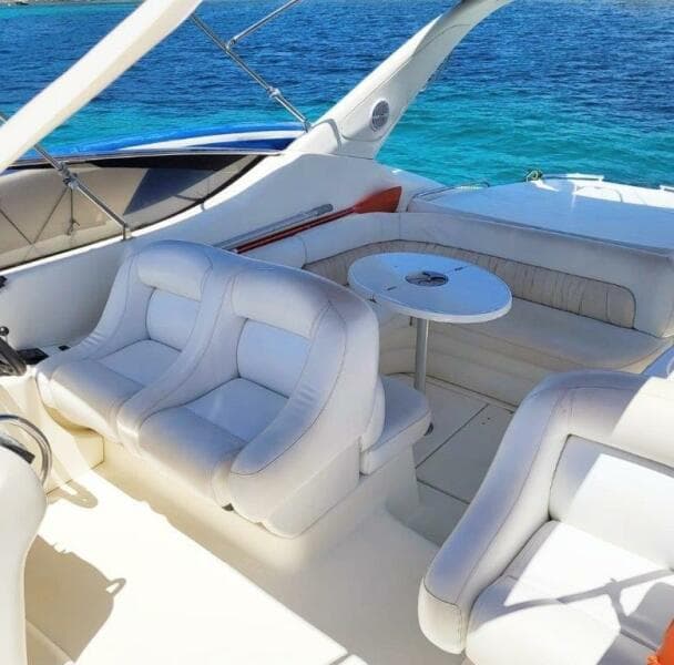 2003 Cranchi Endurance 39 yacht interior with white seating and ocean view.