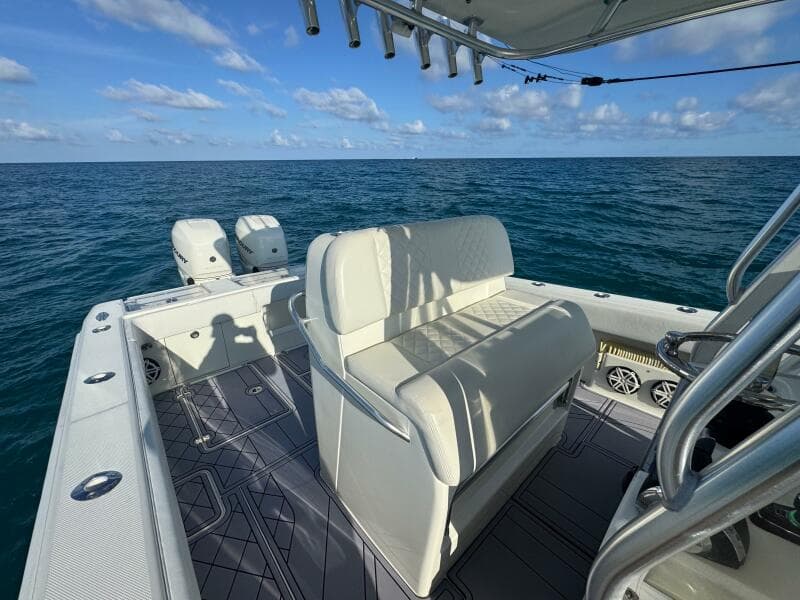 2017 SeaVee 340Z boat on open ocean, featuring dual engines and spacious seating.