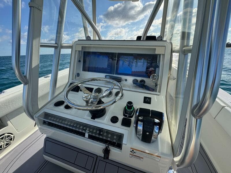 2017 SeaVee 340Z boat helm with dual screens and ocean view.