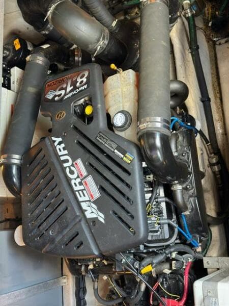 Engine compartment of a 2003 Sea Ray 380 Sundancer with Mercury 5.8 inboard motor.