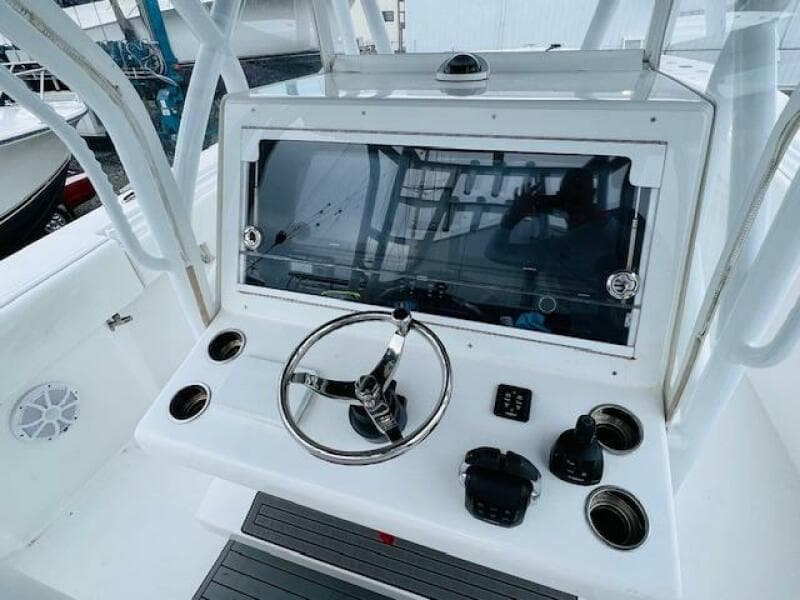 2020 SeaHunter 39 Tournament boat helm with steering wheel and control panel.