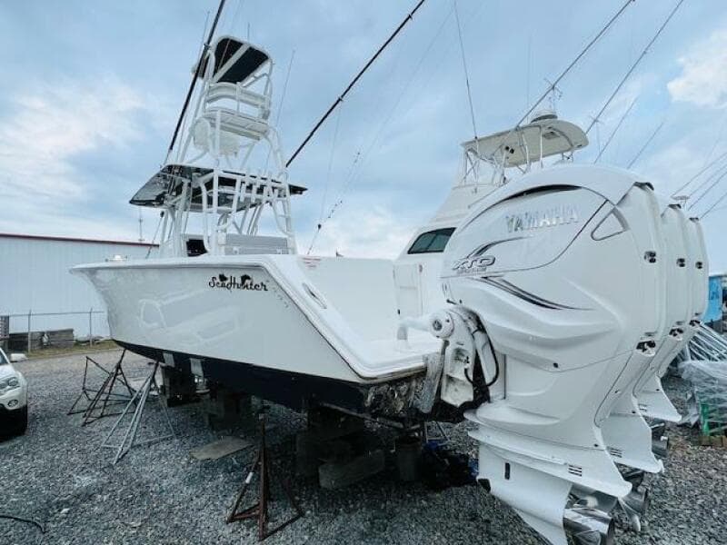 2020 SeaHunter 39 Tournament boat with Yamaha engines, displayed on stands outdoors.