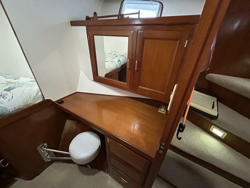 57' DeFever forward guest stateroom desk/vanity