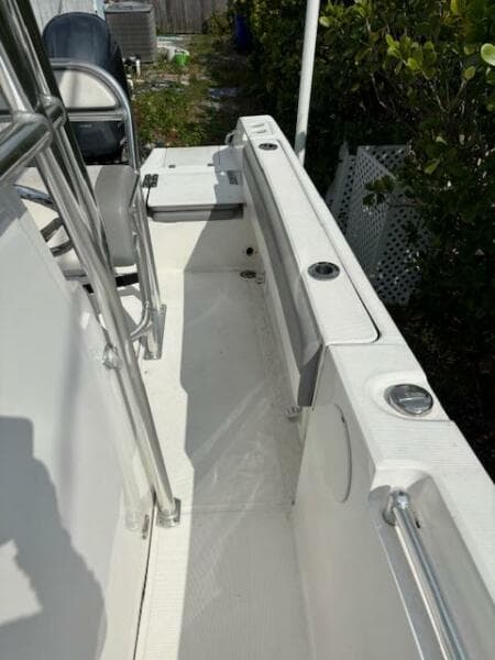 2016 Release 208 RX boat interior with seating and rod holders.