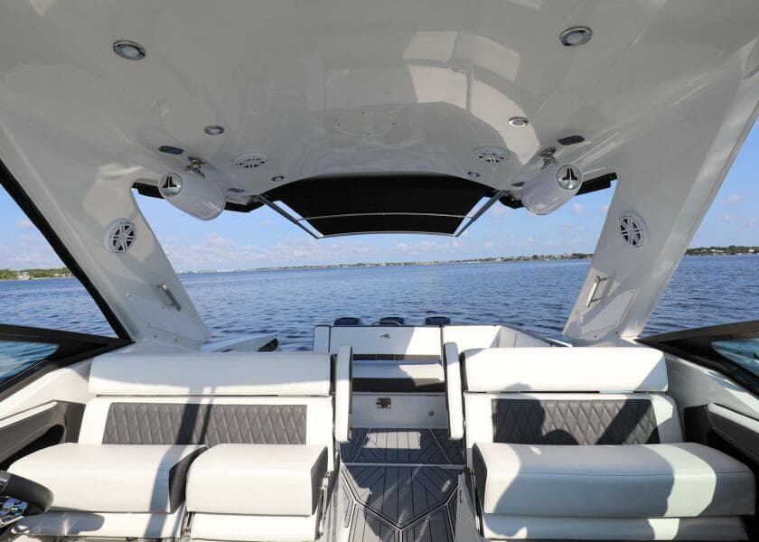 2023 Monterey 385 Super Sport boat interior with luxurious seating and lake view.