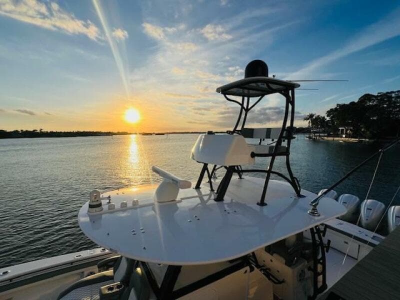 2024 Regulator 41 boat at sunset on calm waters.