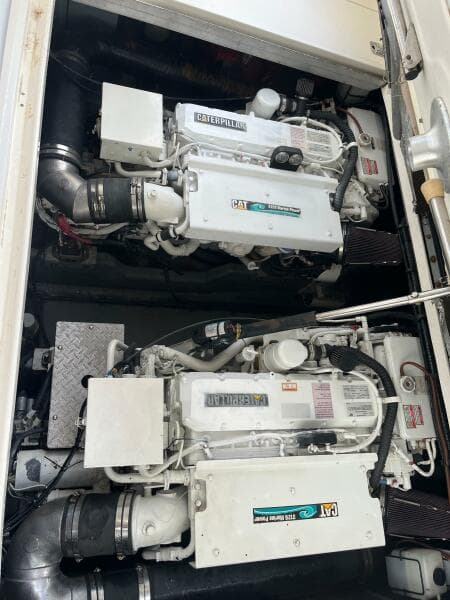 Engine room of 2001 Sea Ray 410 Sundancer with twin marine engines.