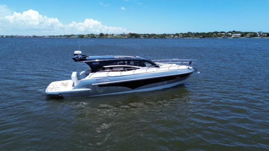 2025 Real 40 HT Luxury yacht cruising on a sunny day.