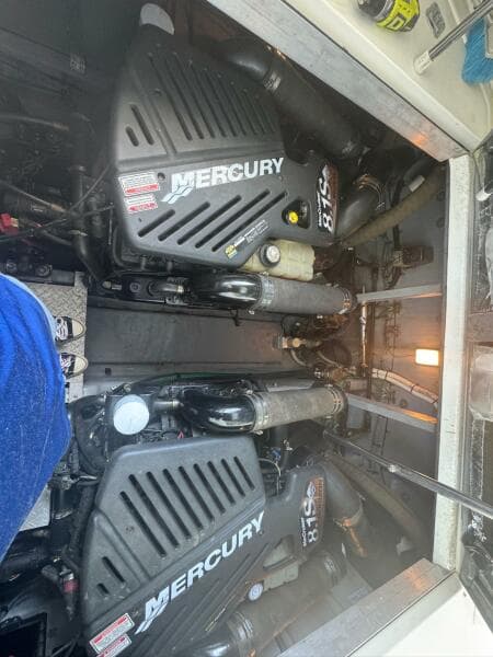 Engine room of a 2001 Sea Ray 380 Sundancer with twin Mercury engines.