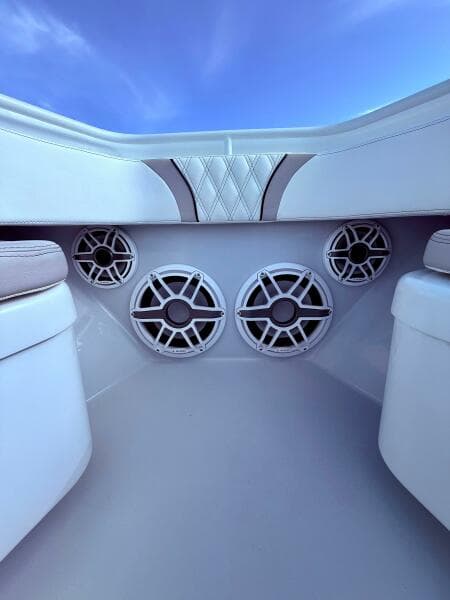 2024 Contender 39 ST boat interior with premium speakers and cushioned seating.