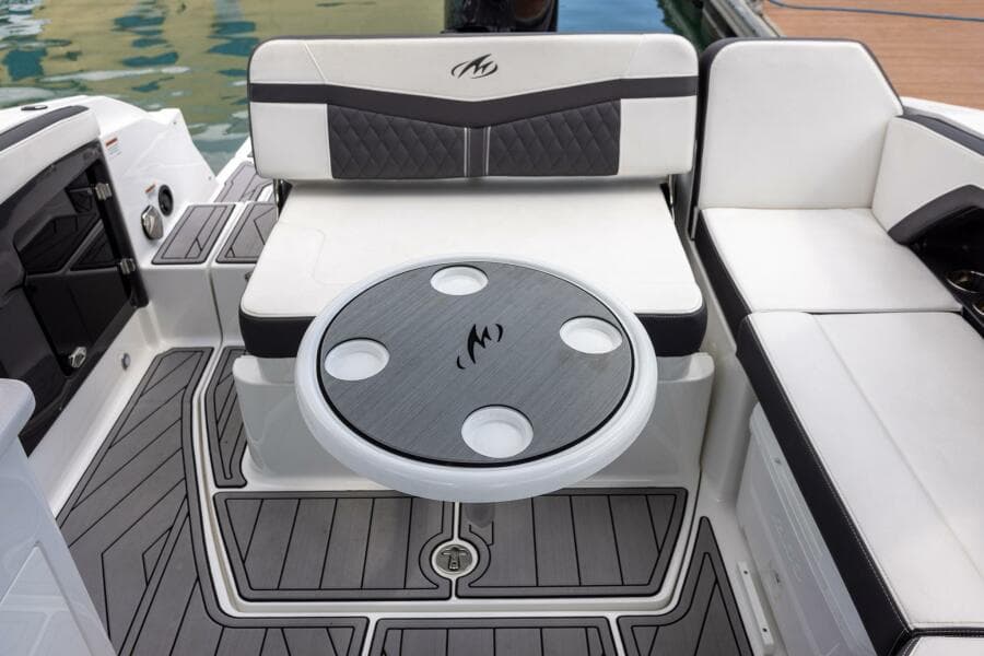 2023 Monterey 255 Super Sport boat interior with seating and table.