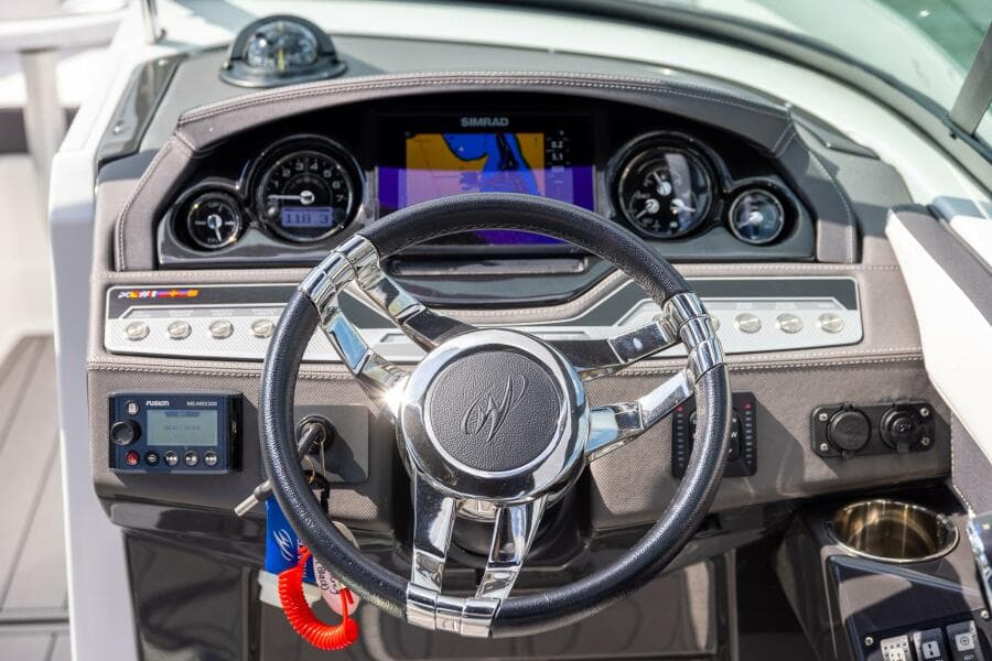 2023 Monterey 255 Super Sport dashboard with steering wheel and navigation display.