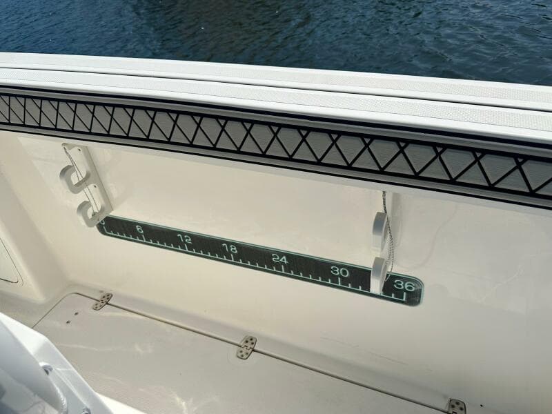 2019 Wellcraft 262 Fisherman boat interior with built-in measuring ruler.