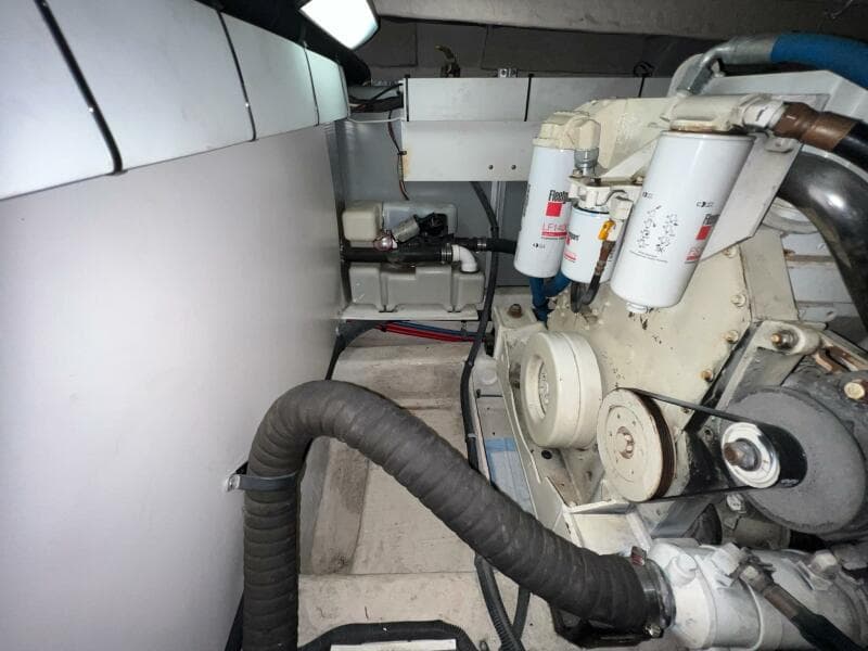 Engine room of a 2005 Sea Ray 500 Sedan Bridge yacht, showcasing mechanical components.