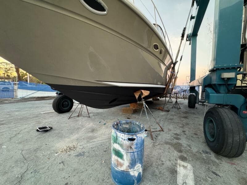 2005 Sea Ray 500 Sedan Bridge yacht in dry dock for maintenance.