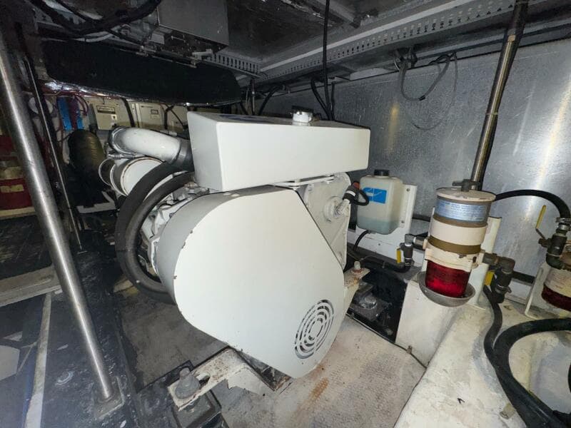 Engine room of 2000 Carver 506 Motor Yacht, showcasing machinery and components.