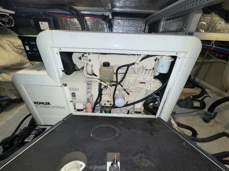 Engine room of 2000 Carver 506 Motor Yacht with Kohler power system.