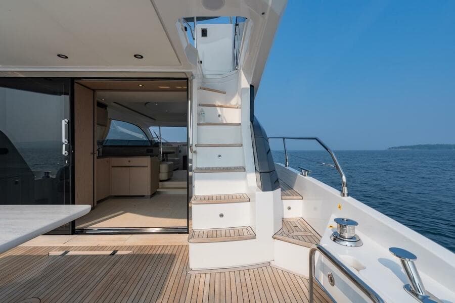2023 Azimut Fly 53 yacht interior with stairs, ocean view, and modern design.