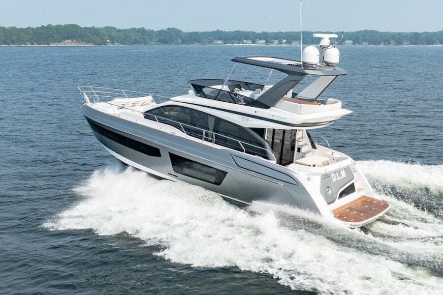 2023 Azimut Fly 53 yacht cruising on open water, showcasing sleek design and luxury features.
