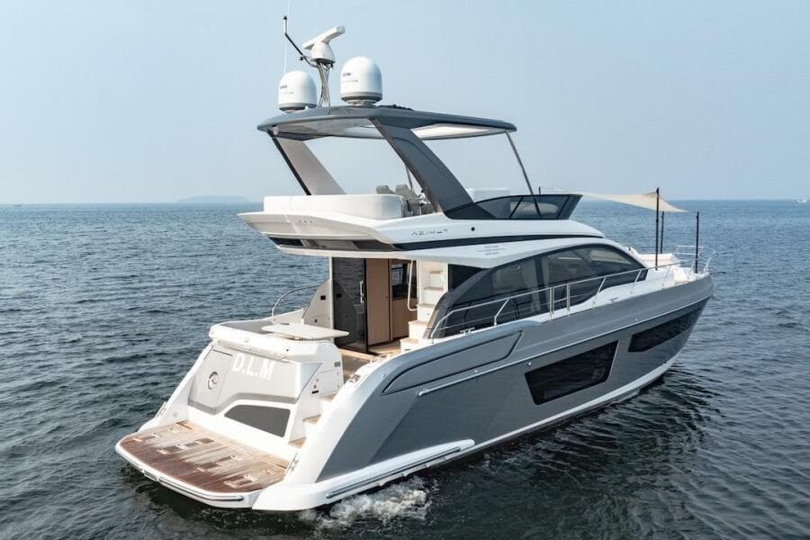 2023 Azimut Fly 53 yacht cruising on open water, showcasing sleek design and luxury features.