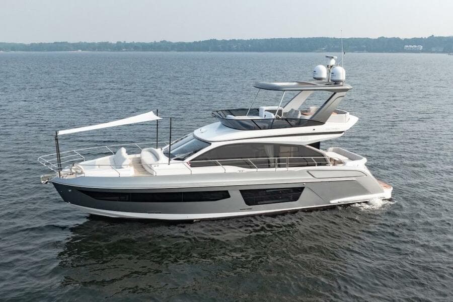 2023 Azimut Fly 53 yacht cruising on open water, showcasing sleek design and luxury features.