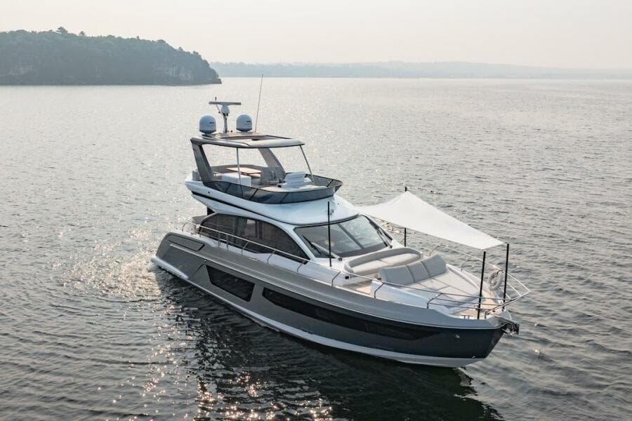 2023 Azimut Fly 53 yacht cruising on calm waters.