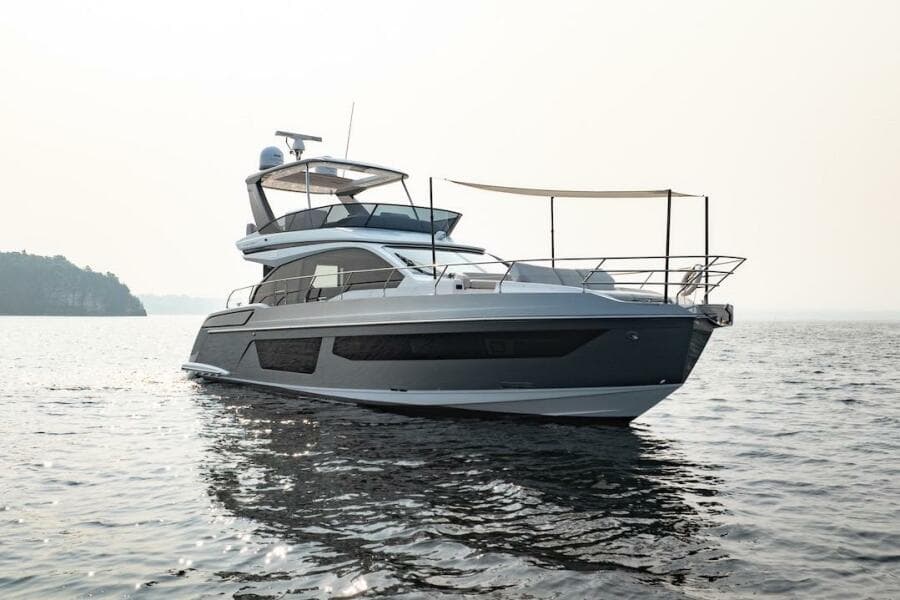 2023 Azimut Fly 53 yacht on calm water, showcasing sleek design and luxury features.