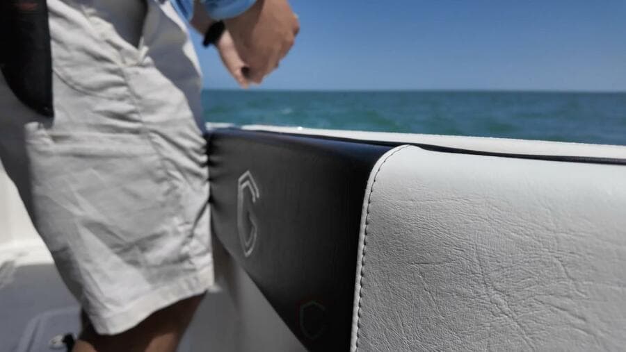 Man on CG Boat Works 35 M-Series, 2023, enjoying ocean view.