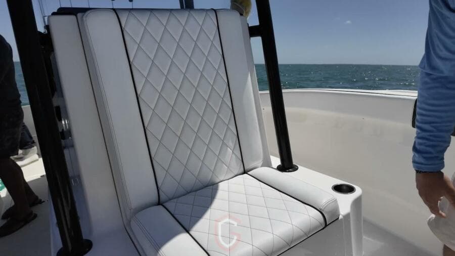 Luxurious seating on 2023 CG Boat Works 35 M-Series, featuring diamond-stitched upholstery.