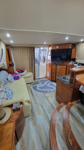 Interior of 2004 Carver 360 Sport Sedan with cozy seating and modern amenities.