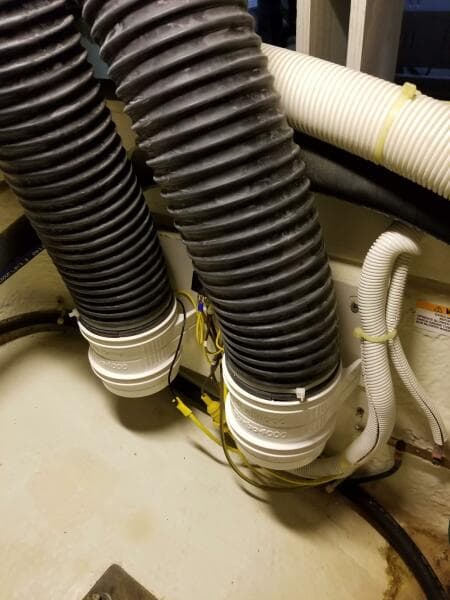 Engine room hoses in a 2004 Carver 360 Sport Sedan boat.
