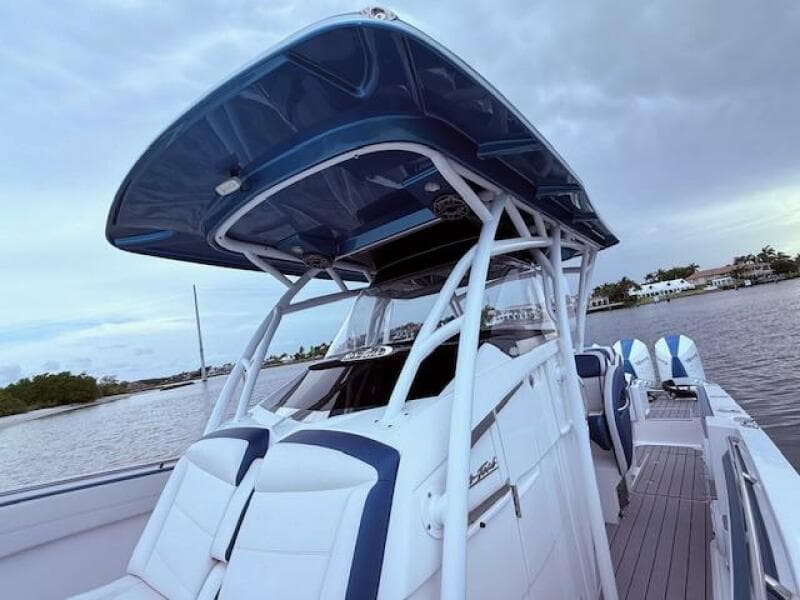 2022 Nor-Tech 390 Sport Center Console boat on water, featuring sleek design and modern amenities.