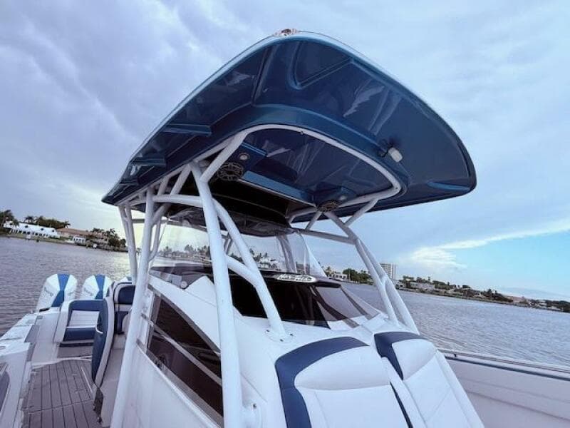 2022 Nor-Tech 390 Sport Center Console boat on water, featuring sleek design and modern amenities.