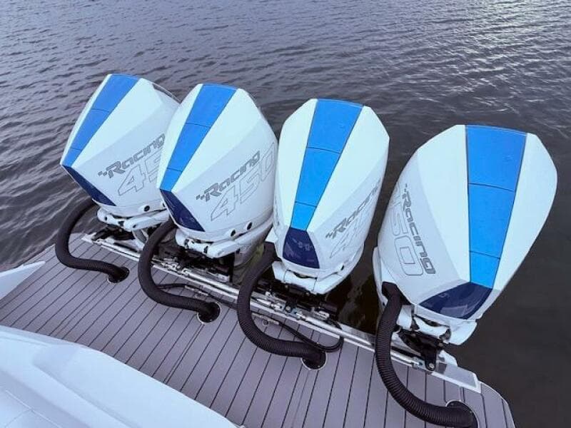 Four powerful outboard engines on a 2022 Nor-Tech 390 Sport Center Console boat.