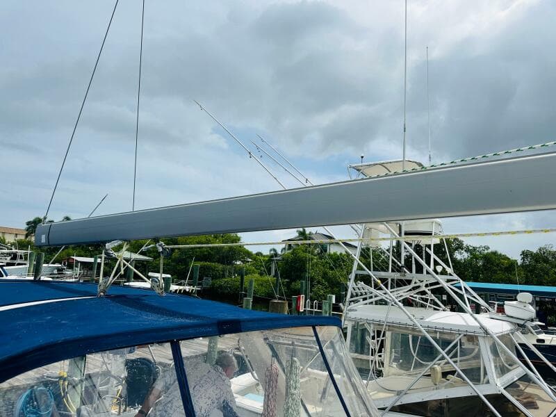 Beneteau Oceanis 45 sailboat, 2015 model, docked with visible rigging and canopy.