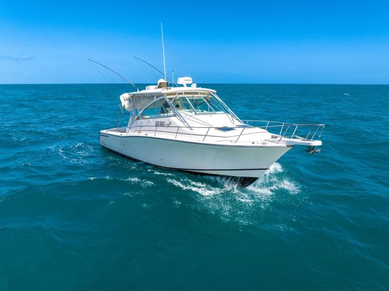2007 Grady-White Express 360 boat cruising on open blue ocean waters.