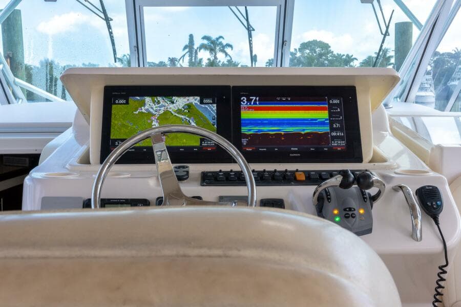 Helm of 2007 Grady-White Express 360 with dual navigation screens and controls.