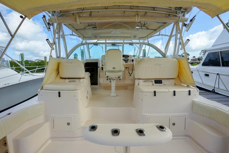 2007 Grady-White Express 360 boat interior with seating and helm, under a canopy.